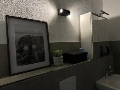 Ein Badezimmer in der Unterkunft areahome