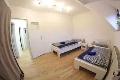 Ein Bett oder Betten in einem Zimmer der Unterkunft Ferienwohnung Kaue