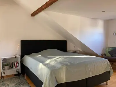 Ein Bett oder Betten in einem Zimmer der Unterkunft Moderne Wohnung mit offenem Wohnkonzept - Hagen Emst