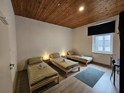 Ein Bett oder Betten in einem Zimmer der Unterkunft homes of ruhr - Monteurwohnung Meißel
