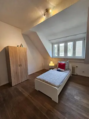Ein Bett oder Betten in einem Zimmer der Unterkunft homes of ruhr - Monteurwohnung Grillo