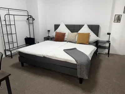 Ein Bett oder Betten in einem Zimmer der Unterkunft SAS Apartments