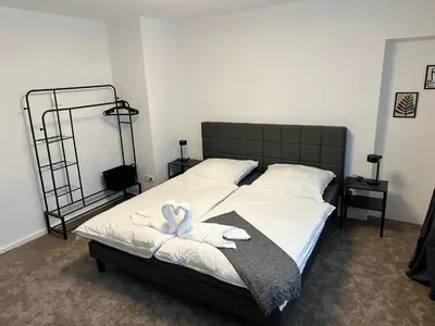 Ein Bett oder Betten in einem Zimmer der Unterkunft SAS Apartments