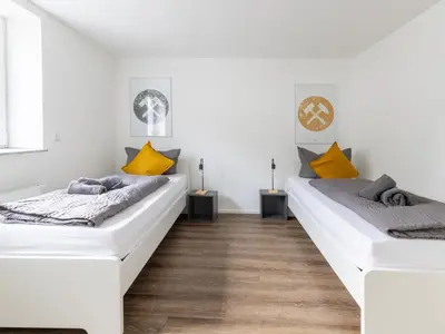 Ein Bett oder Betten in einem Zimmer der Unterkunft 2 BR with free parking and terrace