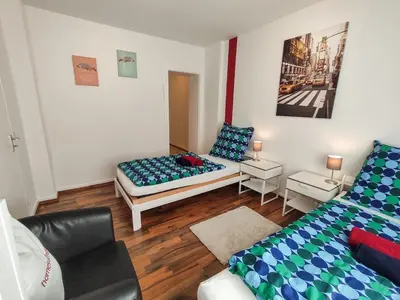 Ein Bett oder Betten in einem Zimmer der Unterkunft homes of ruhr - Monteurwohnung Schimanski