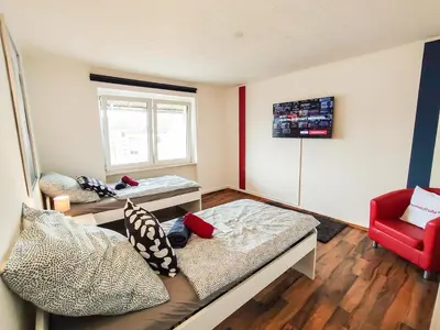 Ein Bett oder Betten in einem Zimmer der Unterkunft homes of ruhr- Monteurwohnung Pilsken