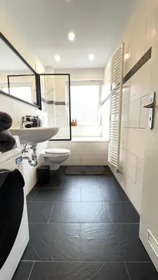 Ein Badezimmer in der Unterkunft Home Apartments two