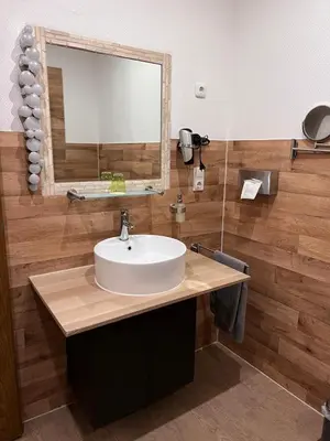 Ein Badezimmer in der Unterkunft Hotel Am Vogelsang
