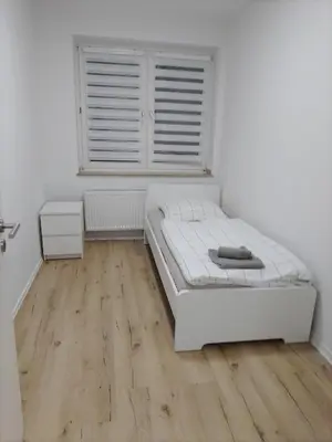 Ein Bett oder Betten in einem Zimmer der Unterkunft Haus Blankenagel 2