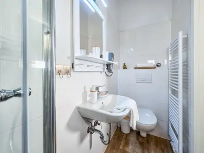 Ein Badezimmer in der Unterkunft Alpha Apartments