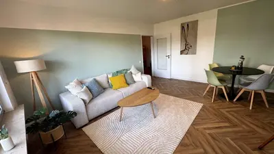 Ein Sitzbereich in der Unterkunft Cozy Apartment with Balcony I free Parking I WiFi