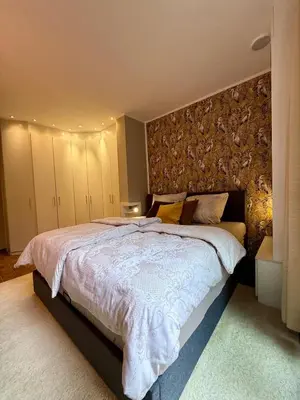 Ein Bett oder Betten in einem Zimmer der Unterkunft Briller Palais