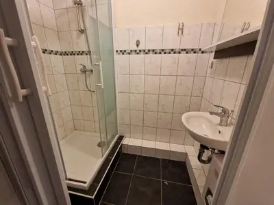 Ein Badezimmer in der Unterkunft BS Comfort Oberhausen-Sterkrade City Apartment