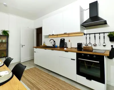 Küche/Küchenzeile in der Unterkunft Moderne Wohnung mit Balkon ideal für Familien und Geschäftsreisende