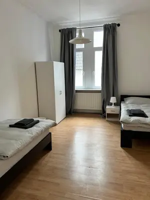 Ein Bett oder Betten in einem Zimmer der Unterkunft FirmenQuartier24 im 2 OG in Wuppertal