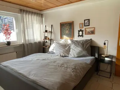 Ein Bett oder Betten in einem Zimmer der Unterkunft Apartment100 qm mit Garten