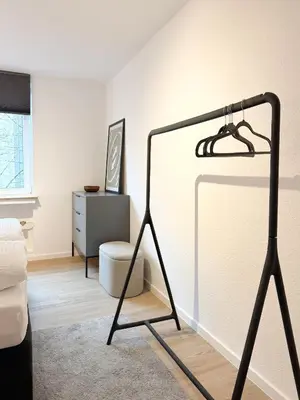 Ein Bett oder Betten in einem Zimmer der Unterkunft Zentrales City-Apartment mit Free WiFi & Self Check-In & Balkon