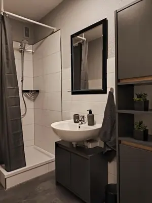 Ein Badezimmer in der Unterkunft City Apartment Leonidas