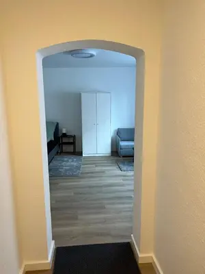 Ein Bett oder Betten in einem Zimmer der Unterkunft Ferienwohnung Ruhr