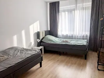 Ein Bett oder Betten in einem Zimmer der Unterkunft Beautiful Apartment in Velbert
