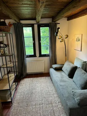 Ein Sitzbereich in der Unterkunft Historische Breidenmühle