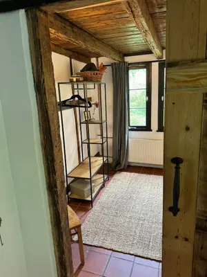 Ein Bett oder Betten in einem Zimmer der Unterkunft Historische Breidenmühle