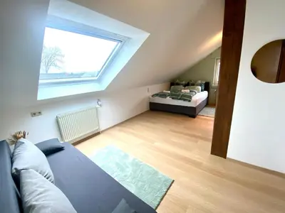 Ein Bett oder Betten in einem Zimmer der Unterkunft Royal Home - Geräumige Ferienwohnung mit Balkon nahe Seepark Lünen und Dortmund!
