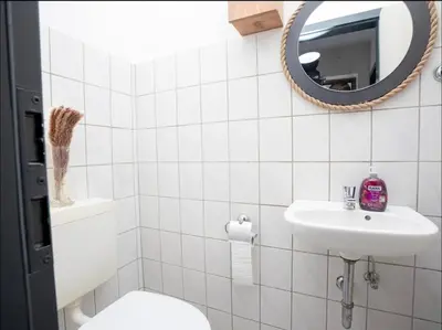 Ein Badezimmer in der Unterkunft Livemore24 - Apartment 2 in Herten West 24-7 Check-in