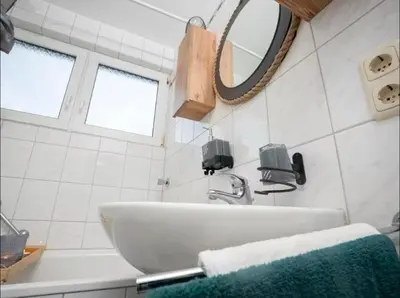 Ein Badezimmer in der Unterkunft Livemore24 - Apartment 3 in Herten West 24-7 Check-in