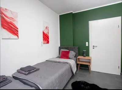 Ein Bett oder Betten in einem Zimmer der Unterkunft Livemore24 - Apartment 1 in Oer-Erkenschwick WLAN