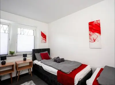 Ein Bett oder Betten in einem Zimmer der Unterkunft Livemore24 - Apartment 2 in Oer-Erkenschwick WLAN