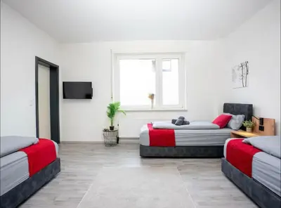 Ein Sitzbereich in der Unterkunft Livemore24 - Space in Herten West 24-7 Check-in