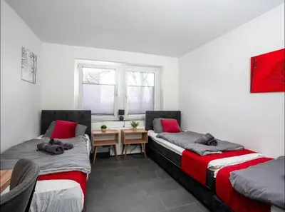 Ein Bett oder Betten in einem Zimmer der Unterkunft Livemore24 - Space in Oer-Erkenschwick WLAN
