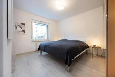 Ein Bett oder Betten in einem Zimmer der Unterkunft Modern & central 2-room apartment