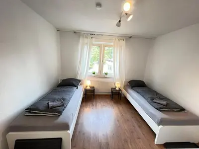 Ein Bett oder Betten in einem Zimmer der Unterkunft Worker Apartment Gelsenkirchen
