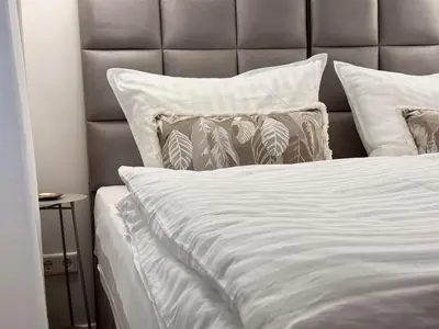 Ein Bett oder Betten in einem Zimmer der Unterkunft Do-Zentrum - Rohdiamant für 4 Personen mit Privatparkplatz