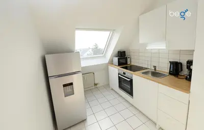 Küche/Küchenzeile in der Unterkunft BEGE APARTMENTS WorkNest Comfort