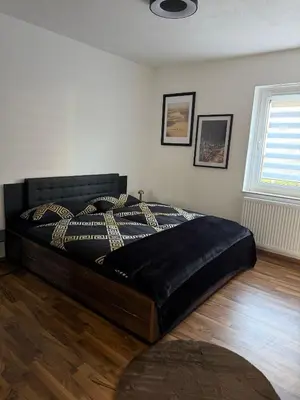 Ein Bett oder Betten in einem Zimmer der Unterkunft Apartment HAMMer