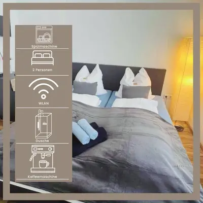 Ein Bett oder Betten in einem Zimmer der Unterkunft Nordsee Apartment