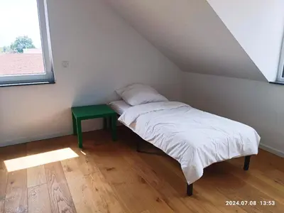 Ein Bett oder Betten in einem Zimmer der Unterkunft Neues 3ZimerHaus Düsseldorf Airport &Messe