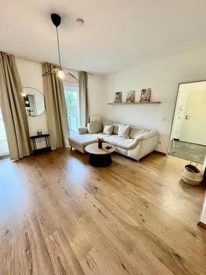 Ein Sitzbereich in der Unterkunft FeWo-Palmtrees 3 - Große und moderne 2 Zimmerwohnung mit Süd-West Balkon in Gladbeck-Mitte nähe Movie Park und Arena AufSchalke