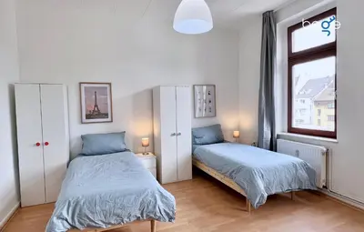 Ein Bett oder Betten in einem Zimmer der Unterkunft BEGE APARTMENTS Momentum Stay