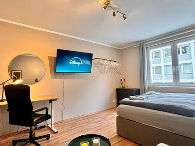 Ein Bett oder Betten in einem Zimmer der Unterkunft Eleganz und Komfort mitten in Essen!
