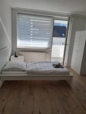 Ein Bett oder Betten in einem Zimmer der Unterkunft Haus Blankenagel 2