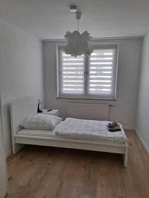 Ein Bett oder Betten in einem Zimmer der Unterkunft Haus Blankenagel 2