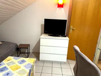 TV/Unterhaltungsangebot in der Unterkunft Ruhiges Apartment, Parkplätze & gute Anbindung City, Messe, Autobahn
