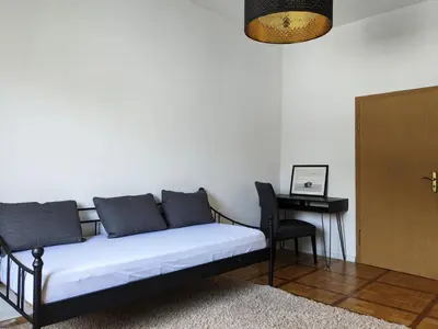 Ein Bett oder Betten in einem Zimmer der Unterkunft Zentral gelegen, Sehr geräumig, 3 Zimmer, 3 Betten