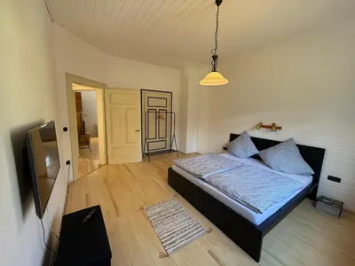 Ein Bett oder Betten in einem Zimmer der Unterkunft Ferien und Arbeiten am Hasten