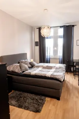 Ein Bett oder Betten in einem Zimmer der Unterkunft M House HA City Privatzimmer Self Check-In