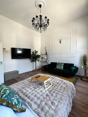 Ein Bett oder Betten in einem Zimmer der Unterkunft Premium-Apartment im Duisburger Süden, nähe Düsseldorf Flughafen & Messe, Komplett ausgestattetes Apartment mit modernen Altbau-Flair